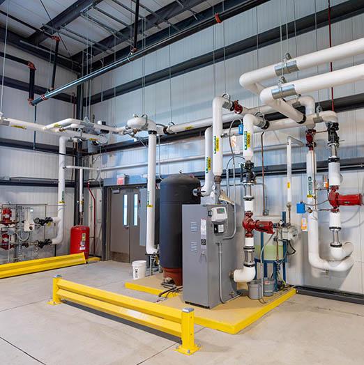 Cemline boilers provide backup hydronic heating power for especially cold days at Evergy Emporia Service Center.